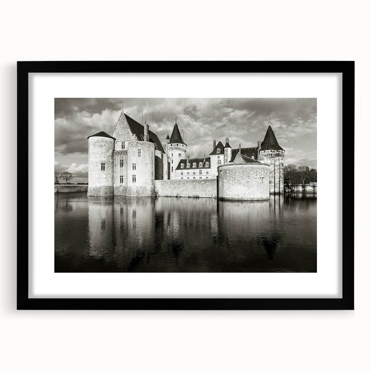 Framed wall art collection showcasing a stunning landscape with a castle design, featuring a sleek black frame and white mat, ideal for home decor enhancement.