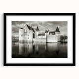 Framed wall art collection showcasing a stunning landscape with a castle design, featuring a sleek black frame and white mat, ideal for home decor enhancement.