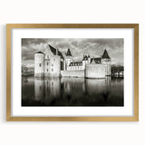 Elegant gold-framed wall art featuring a picturesque landscape of a majestic castle, designed with a matte finish, perfect for enhancing home decor and interior design aesthetics.