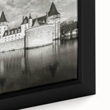Framed canvas wall art showcasing a serene landscape with a majestic castle, featuring rich colors and intricate details, perfect for home decor enthusiasts.