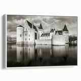 Framed canvas wall art showcasing a scenic landscape with a majestic castle, presented in a sleek white frame. Perfect for enhancing home decor with elegance.