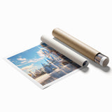 Rolled print of a vibrant landscape featuring a majestic castle surrounded by lush greenery and a clear blue sky, ideal for home decor and art enthusiasts.