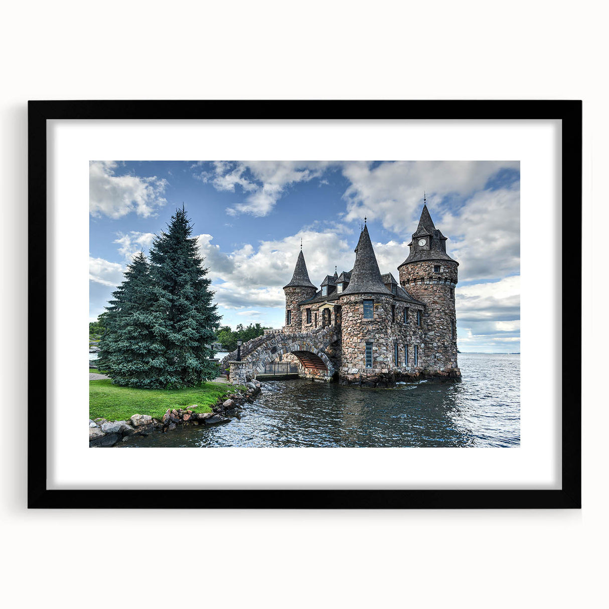 Framed wall art showcasing a stunning landscape of a castle, featuring a sleek black frame and matting, perfect for home decor enhancement. The intricate details and vibrant colors of the castle scene create an inviting focal point for any room, ideal for art lovers.