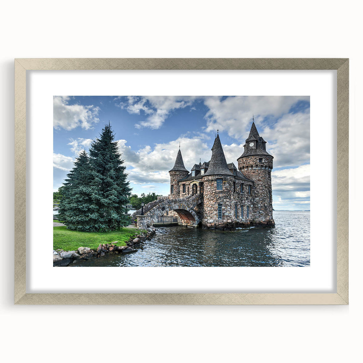 Framed wall art collection featuring a landscape and castle design, elegantly presented with a silver frame and mat, ideal for home decor enthusiasts.