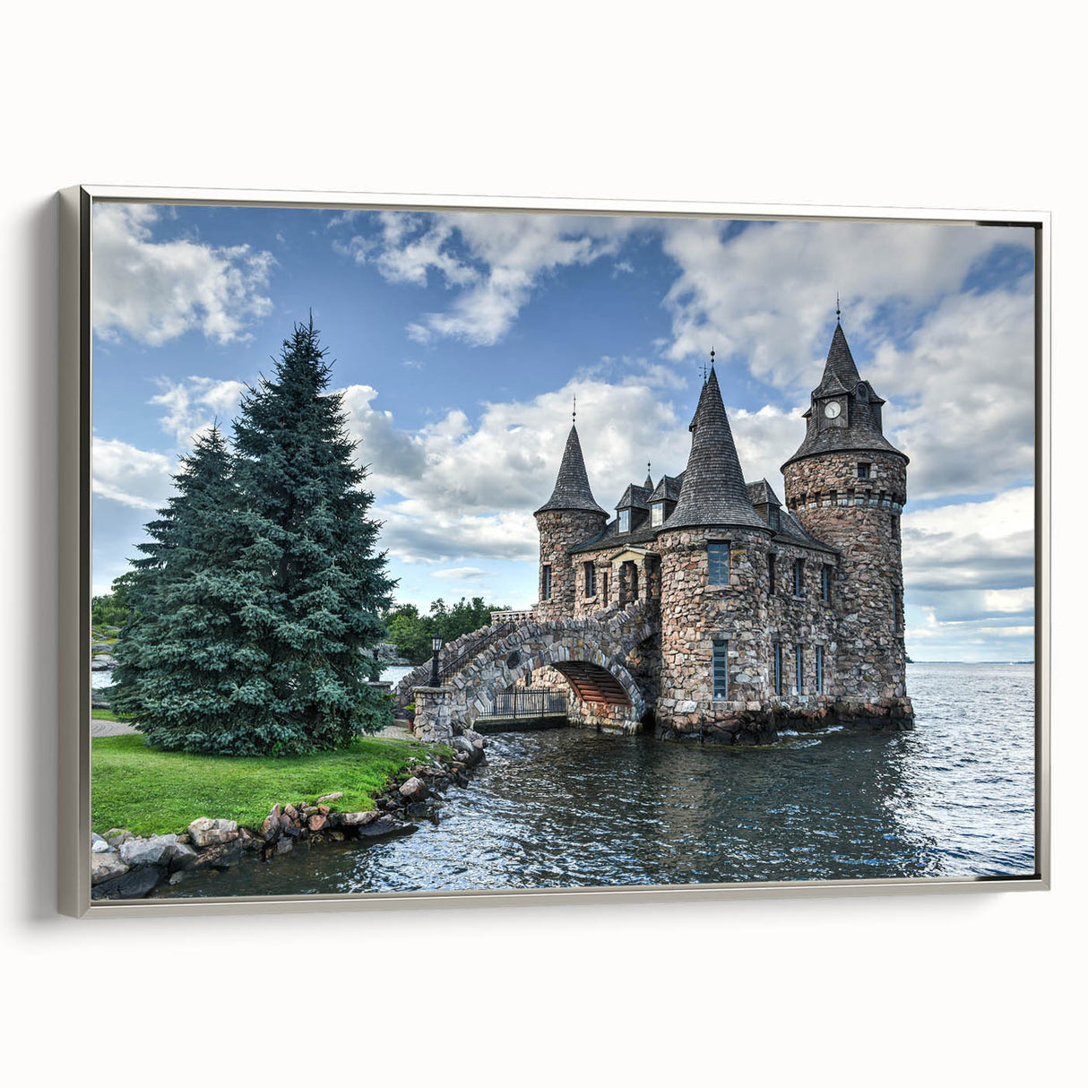 Framed wall art showcasing a picturesque castle landscape design, featuring intricate details and a silver frame, ideal for enhancing home decor.