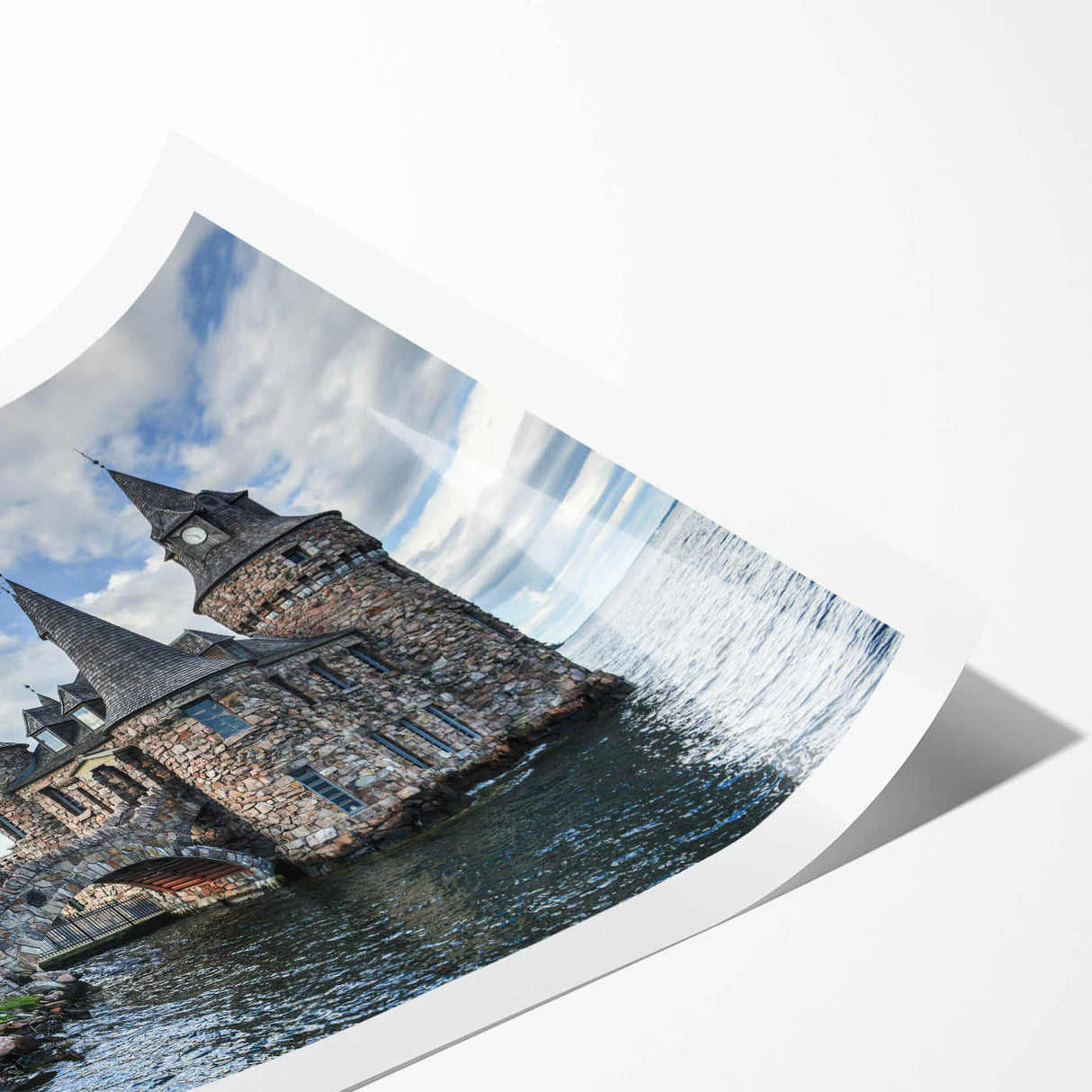 Rolled print showcasing a stunning landscape castle design in vibrant colors, perfect for home decor. Packaged securely in a cardboard tube for safe delivery.