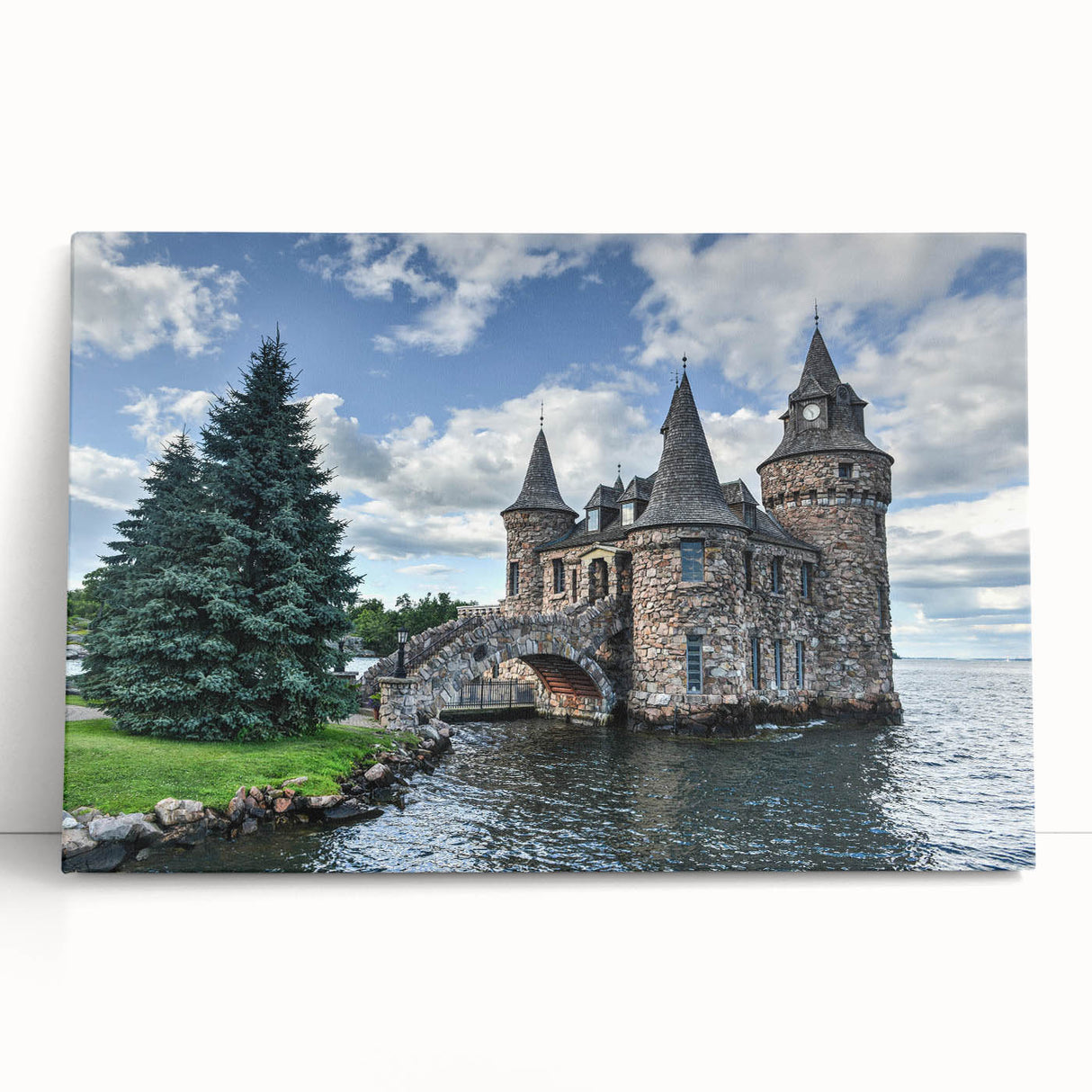 Stretched canvas artwork showcasing a picturesque landscape with a majestic castle, featuring vibrant colors and intricate details, perfect for home decor.