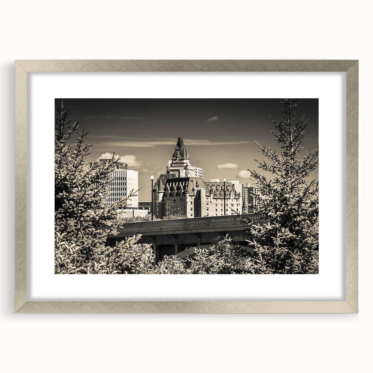 Framed wall art collection showcasing a picturesque landscape with a castle, featuring a silver frame and white matting, ideal for home decor enhancement.