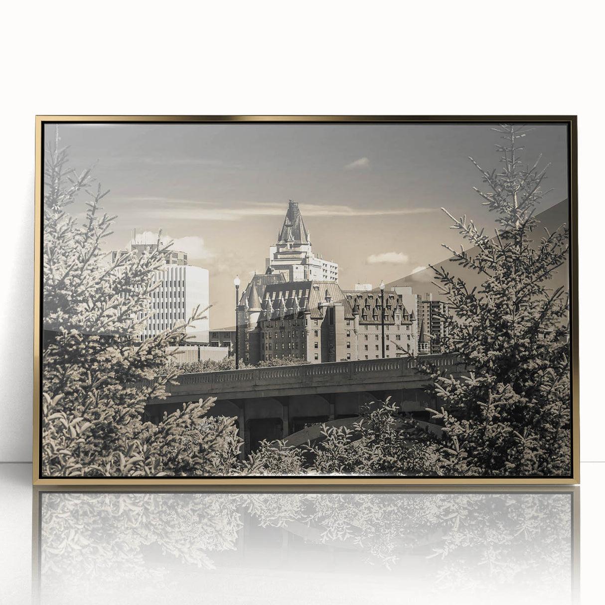 Framed wall art featuring a picturesque landscape of a majestic castle, elegantly displayed in a gold-acrylic frame, perfect for enhancing home decor.
