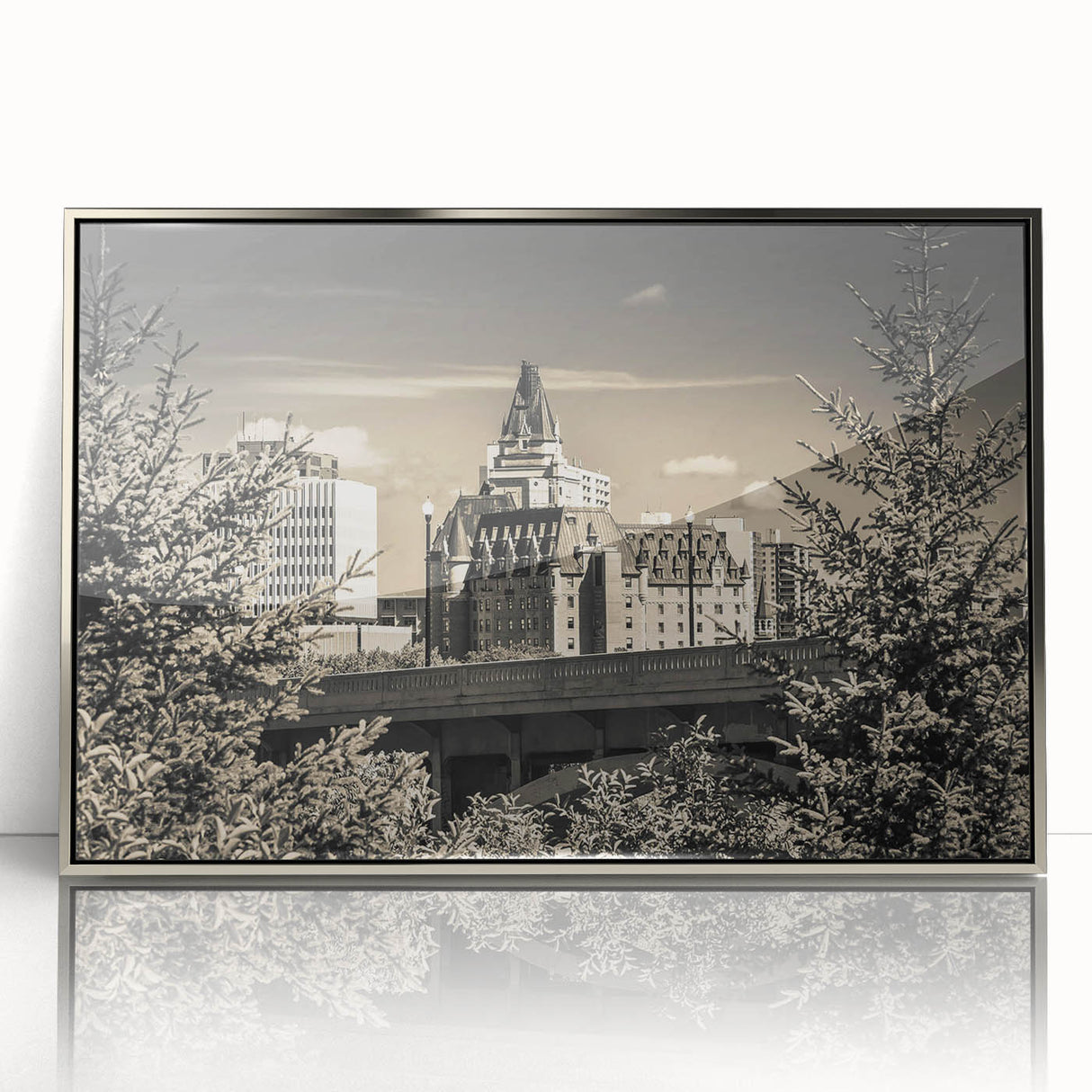 Framed acrylic wall art showcasing a stunning landscape of a castle, featuring intricate details and a silver frame, perfect for enhancing home decor.