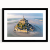 Framed wall art showcasing a stunning landscape featuring a majestic castle, set against a vibrant sunset backdrop, with a sleek black mat and frame.