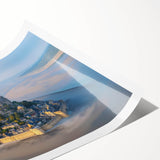 Rolled print showcasing a stunning landscape of a historic castle surrounded by lush greenery, perfect for home decor, highlighting intricate architectural details and vibrant colors.