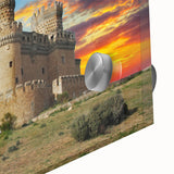 Close-up of an elegant wall art piece showcasing a vibrant landscape with a majestic castle, printed on acrylic glass to enhance color depth and detail.