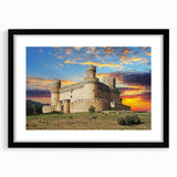 Framed wall art of a serene landscape featuring a majestic castle, set in a black frame with a white mat, perfect for home decor and interior design enthusiasts.
