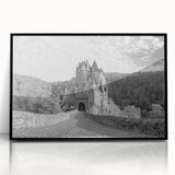 Framed acrylic wall art showcasing a stunning landscape with a medieval castle, featuring a black frame and vivid colors, perfect for home decor or office spaces.