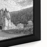 Framed canvas wall art showcasing a vibrant landscape with a majestic castle, rich colors, and intricate details set against a serene backdrop, perfect for home decor.