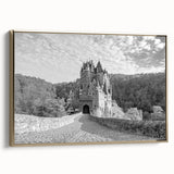 Framed canvas wall art showcasing a stunning landscape featuring a majestic castle, with a gold frame accentuating the vibrant colors and intricate details, ideal for home decor.