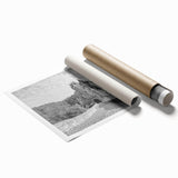 Rolled print of a stunning landscape featuring a historic castle surrounded by lush greenery, designed for wall art display, showcasing vibrant colors and intricate details in a protective cardboard tube.