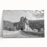 Stretched canvas wall art showcasing a vibrant landscape of a majestic castle surrounded by lush greenery, perfect for adding elegance to any home decor.