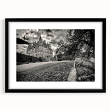 Framed black wall art showcasing a detailed landscape of a majestic castle, complete with a mat for added elegance, ideal for home decor and enhancing interior aesthetics.