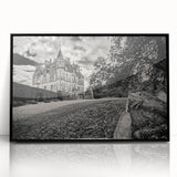 Framed wall art featuring a stunning landscape of a castle, designed with intricate details and a sleek black frame, perfect for home decor and interior design enthusiasts.