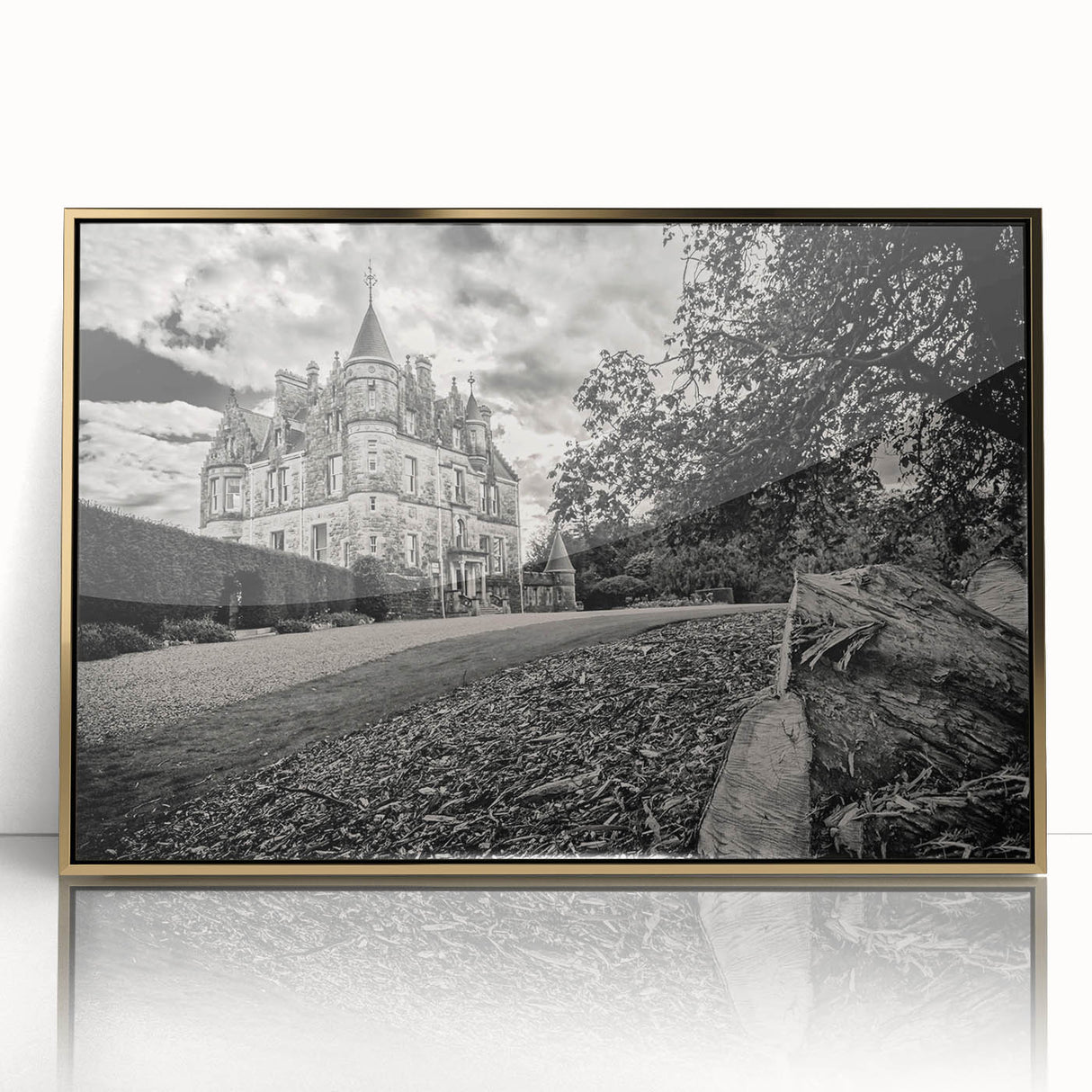 Framed wall art piece showcasing a stunning landscape with a castle, featuring a gold-accented frame and acrylic front, perfect for home decor enhancement.