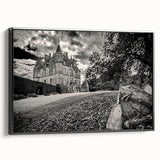 Framed canvas wall art showcasing a stunning landscape with a castle, featuring a sleek black frame. Perfect for enhancing home decor with a touch of elegance.