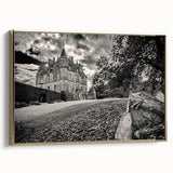 Framed canvas wall art showcasing a scenic landscape with a majestic castle, adorned with gold accents, viewed from the side to highlight its elegant design and texture. Perfect for enhancing home decor with a touch of royalty and sophistication.