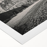 Rolled canvas artwork depicting a vibrant landscape with a majestic castle, featuring rich colors and intricate details, perfect for home decor enhancement.