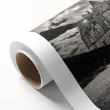 Rolled canvas print showcasing a stunning landscape featuring a majestic castle surrounded by lush greenery, perfect for enhancing home decor with elegance and charm.