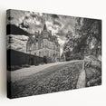 Stretched canvas artwork showcasing a picturesque landscape with a majestic castle, featuring vibrant colors and intricate details, ideal for home decor.