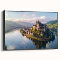 Framed canvas wall art depicting a stunning landscape with a castle, showcasing intricate details and vibrant colors, set against a sleek black frame.