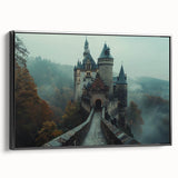 Framed canvas wall art depicting a majestic castle landscape scene, featuring rich colors and intricate details, presented in a sleek black frame, ideal for home decor.