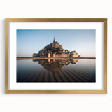 Elegant gold-framed wall art featuring a detailed landscape of a castle, surrounded by lush greenery. Perfect for home décor, it adds a touch of sophistication.
