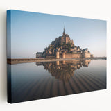 Stretched canvas wall art featuring a picturesque landscape of a majestic castle surrounded by lush greenery, ideal for enhancing home decor with a touch of elegance.