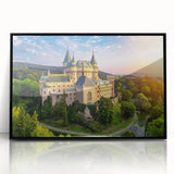 Framed wall art showcasing a stunning landscape of a castle, presented in an elegant black frame with acrylic front for a sleek finish, perfect for home decor.