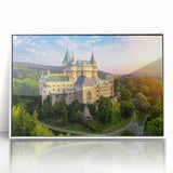 Framed acrylic wall art showcasing a captivating landscape with a historic castle, featuring vibrant colors and intricate details, ideal for home decor enhancement.