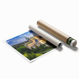 Stunning landscape wall art print showcasing a majestic castle against a vibrant sunset sky, rolled and ready for framing, perfect for home decor enthusiasts.