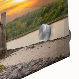 Close-up of a vibrant acrylic glass wall art piece showcasing a stunning landscape with a castle, perfect for home decor enthusiasts seeking unique artistic expressions.