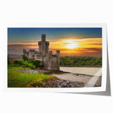 Landscape wall art featuring a majestic castle set against a vibrant sunset, rolled and ready for framing. Ideal for adding a touch of elegance to home décor.