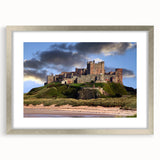 Framed wall art featuring a stunning landscape with a castle design, accented by a silver mat and frame, perfect for enhancing home decor with elegance.