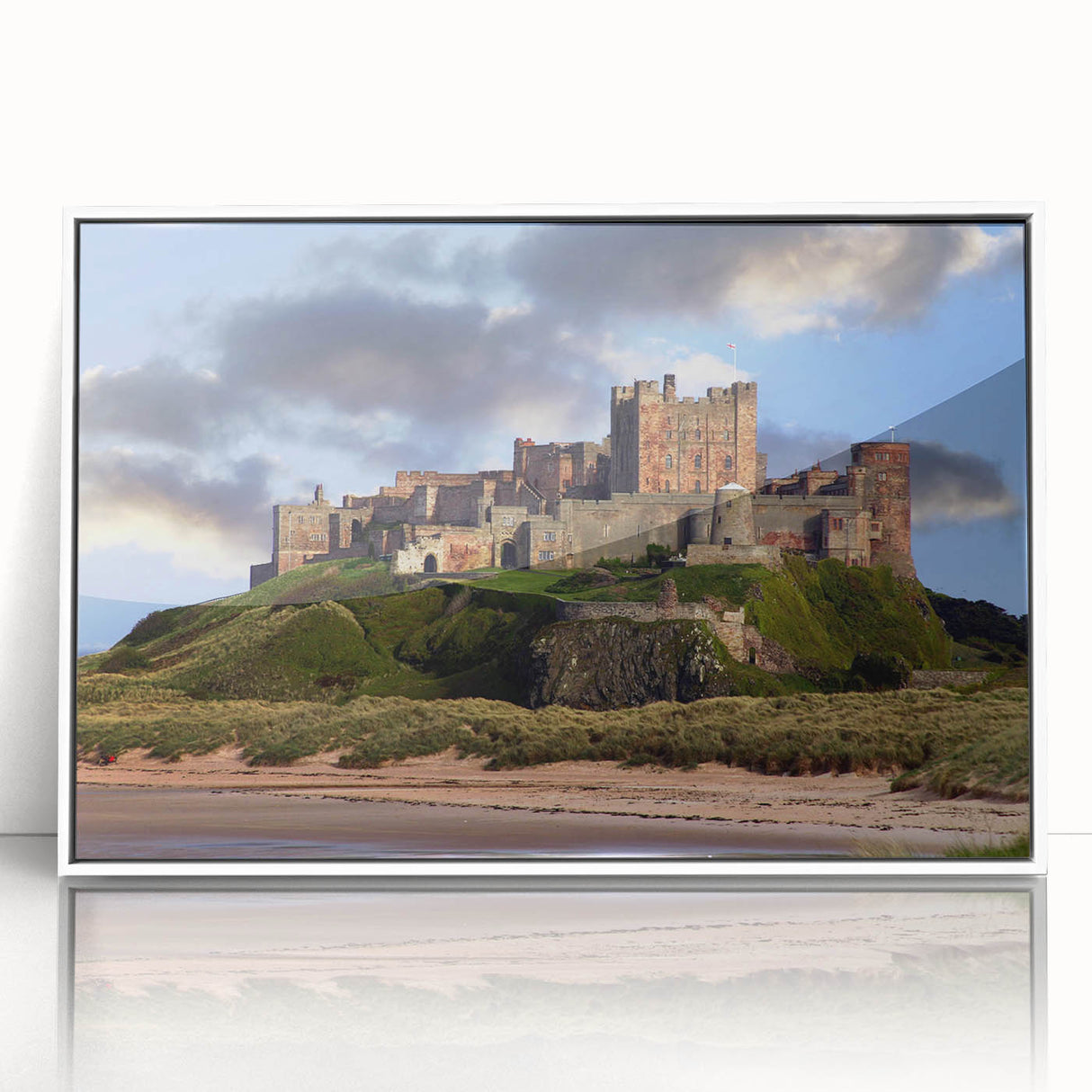 Framed wall art featuring a vibrant landscape of a majestic castle surrounded by lush greenery, showcased in a sleek white frame, ideal for home decor.
