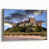 Framed canvas wall art depicting a stunning landscape with a castle, elegantly showcased with a silver frame, perfect for enhancing home decor aesthetics.