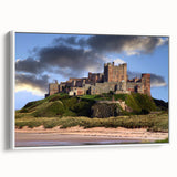 Framed canvas wall art showcasing a serene landscape with a majestic castle surrounded by lush greenery, ideal for home decor and artistic settings.