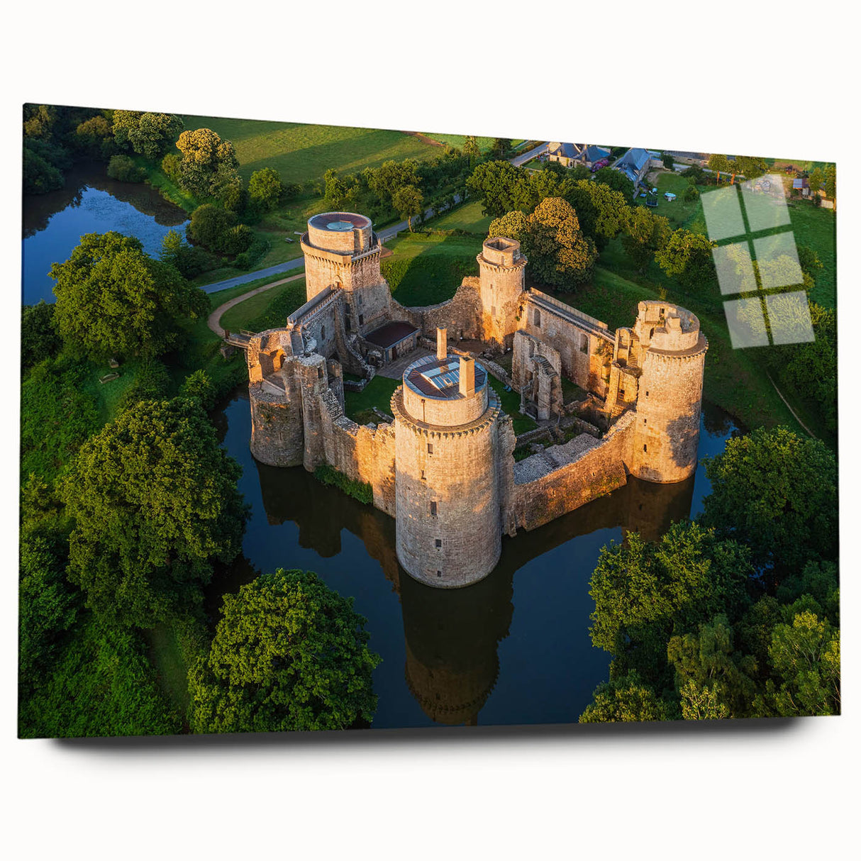 Acrylic glass wall art display showcasing a vibrant landscape of a castle, featuring intricate details and rich colors, perfect for home decor enhancement.