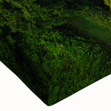 Close-up of a stretched canvas wall art featuring an intricate landscape design with a castle, showcasing vibrant colors and detailed textures, perfect for home decor.