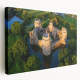 Stretched canvas wall art featuring a stunning landscape with vibrant colors and intricate details of a medieval castle surrounded by lush greenery, perfect for home decor.