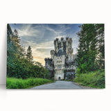 Stretched canvas wall art showcasing a vibrant landscape of a medieval castle surrounded by lush greenery, perfect for home decor and art enthusiasts.