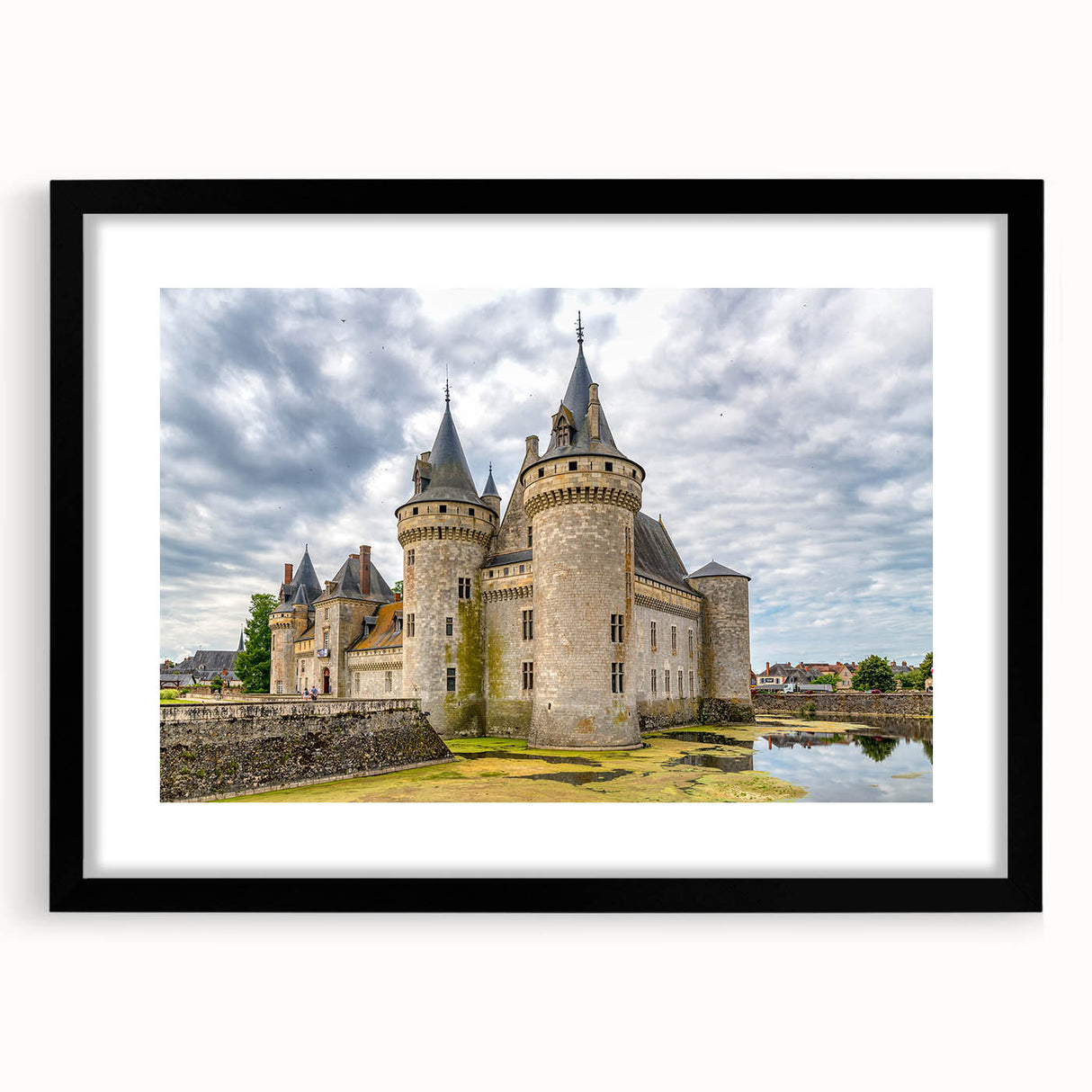 Framed wall art collection showcasing a stunning landscape of a castle, presented in a sleek black frame with matting, ideal for home decor enthusiasts.