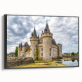 Framed canvas wall art collection showcasing a scenic castle landscape design in vibrant colors, with a sleek black frame, viewed from the side. Perfect for home decor enthusiasts seeking elegant and artistic touches to their interiors.